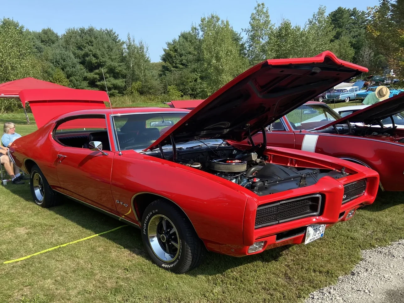 Red Pontiac GTO at Freddie's Cruise-In 2022 in Vassalboro, Maine.