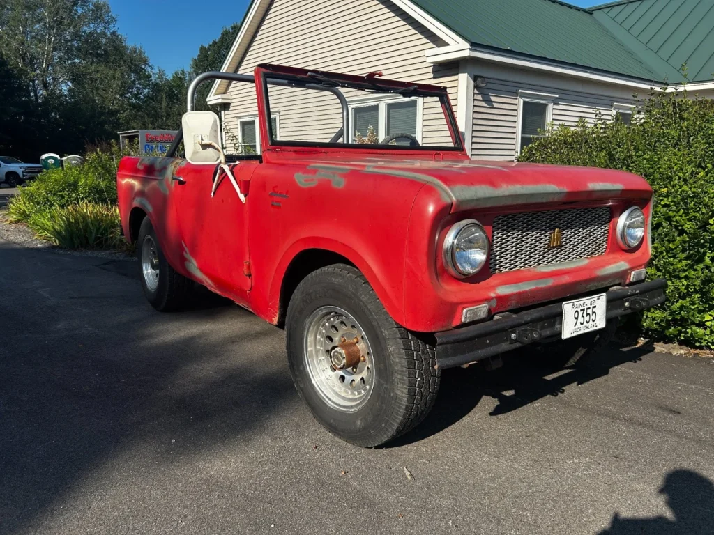 Red 1961–1965 International Harvester Scout 80 at Freddie's Cruise-In 2023.