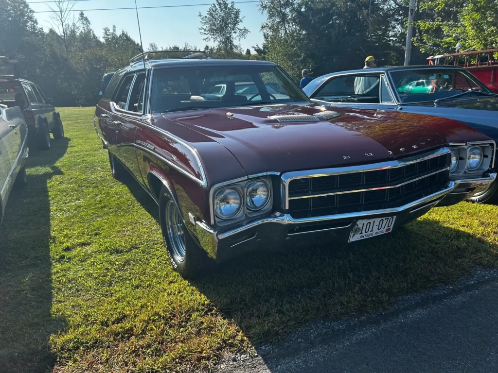 Alternate view of a maroon 1969 Buick Custom Sportwagon at Freddie's Cruise-In 2023.