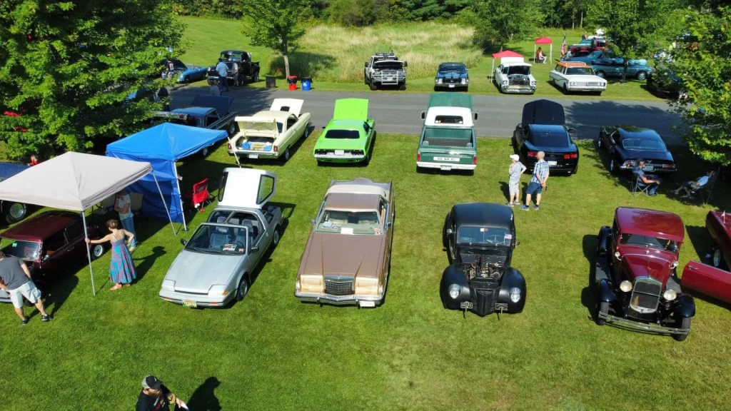 Drone view of the Freddie's Cruise-In 2023 show field and parked cars.