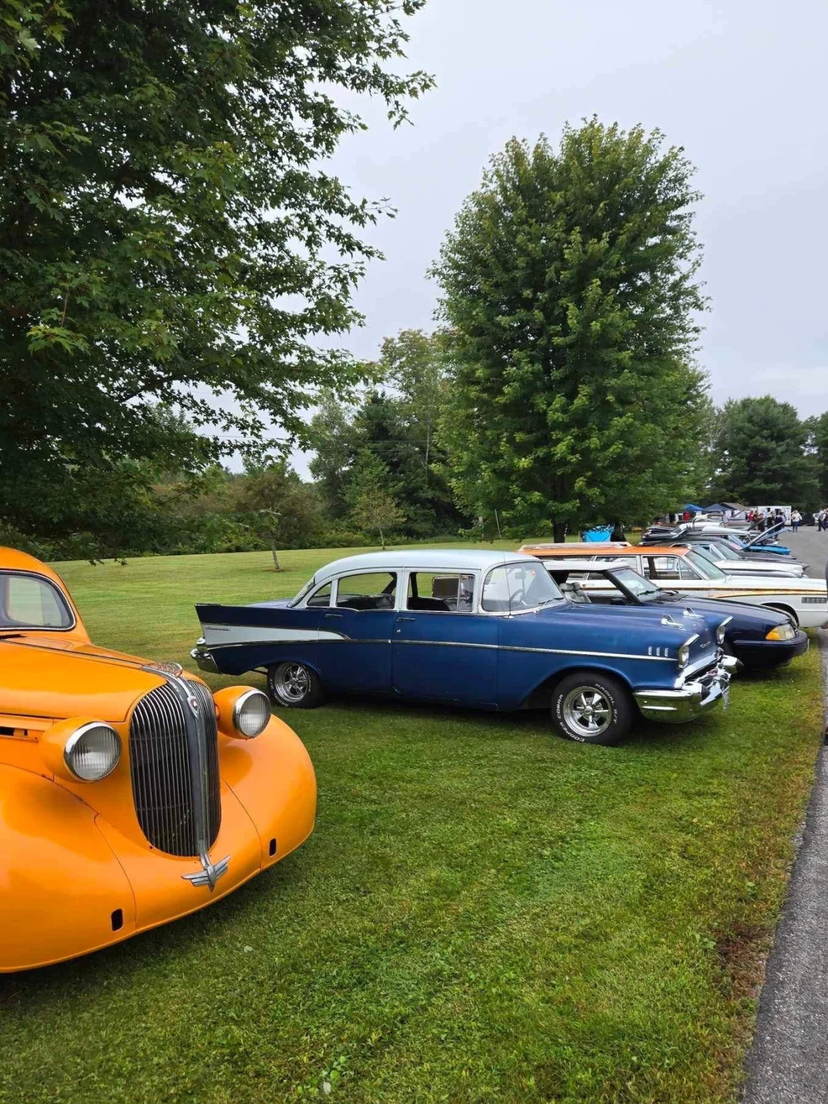 Row of classic cars at Freddie's Cruise-In 2024.