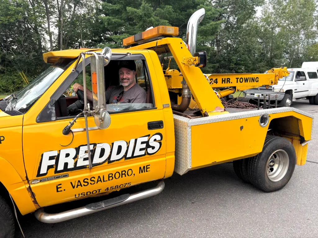 Freddie's yellow 1964 GMC wrecker at Freddie's Cruise-In 2025.