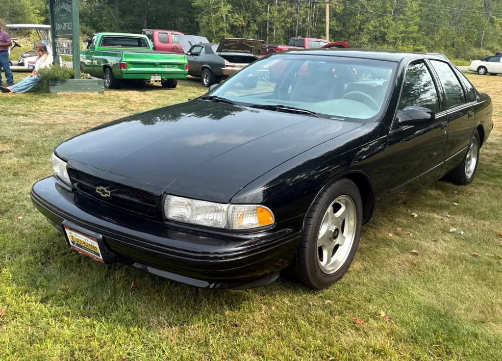 Black 1994 Chevrolet Impala SS at Freddie's Cruise-In 2025.