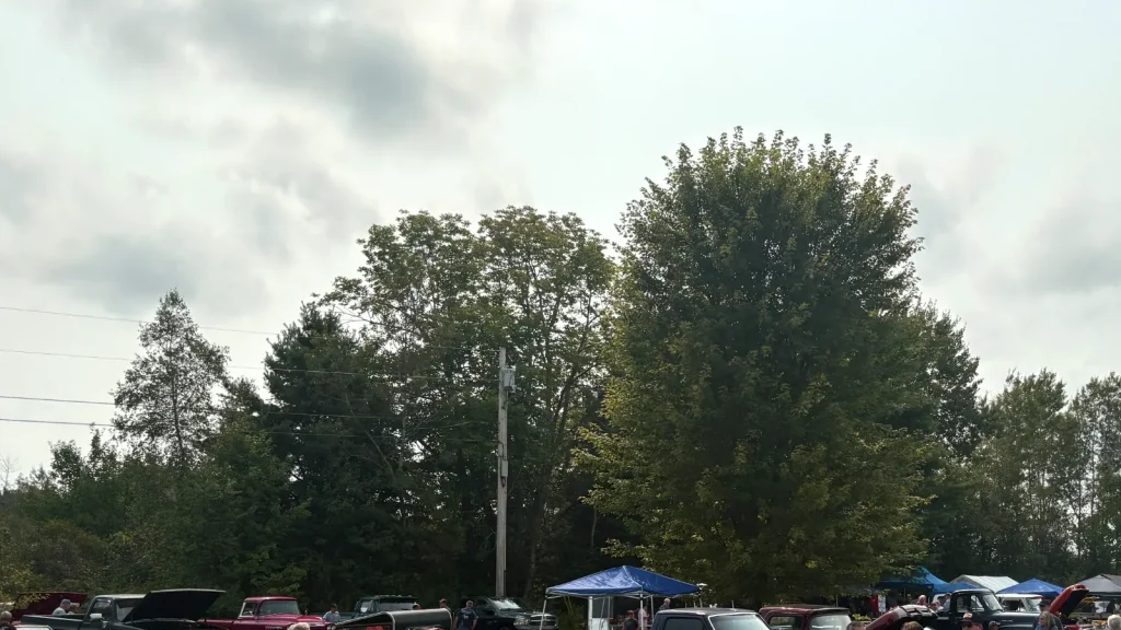 Wide view of classic cars and spectators along the show field at Freddie's Cruise-In 2025.