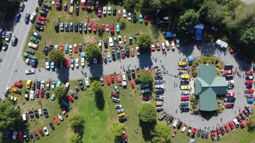 Aerial view of organized classic car rows at Freddie's Cruise-In 2026 in Vassalboro, Maine.
