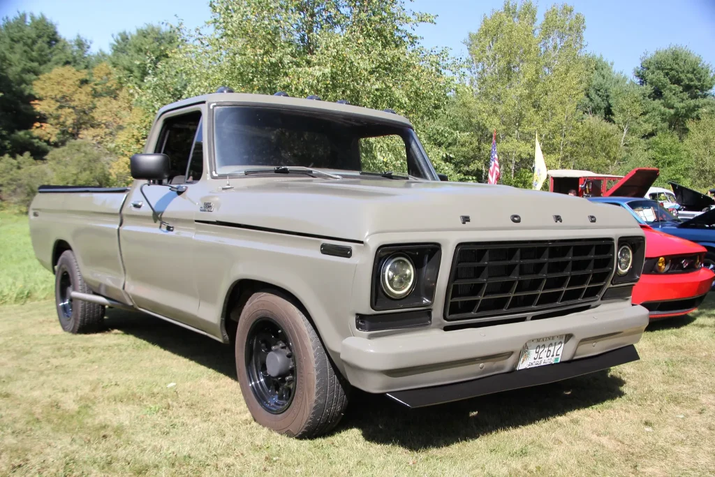 Beige classic Ford pickup displayed at Freddie's Cruise-In 2026 in Vassalboro, Maine.