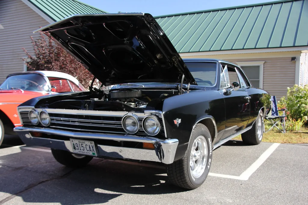 Black Chevrolet Chevelle with its hood open at Freddie's Cruise-In 2026 in Vassalboro, Maine.