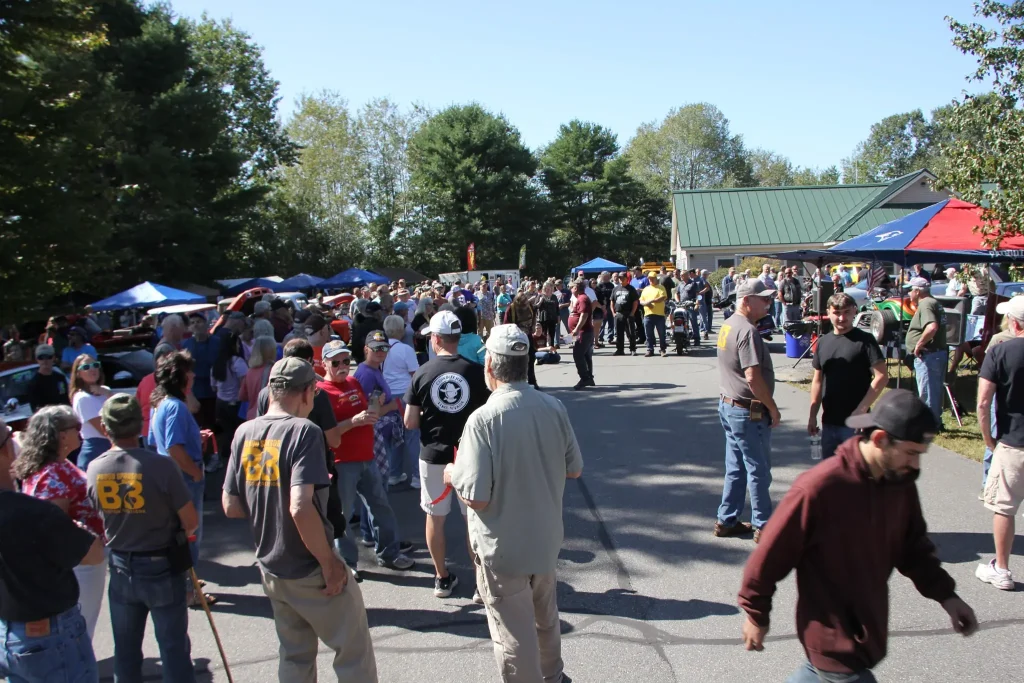 A large crowd gathered among the show vehicles at Freddie's Cruise-In 2026 in Vassalboro, Maine.
